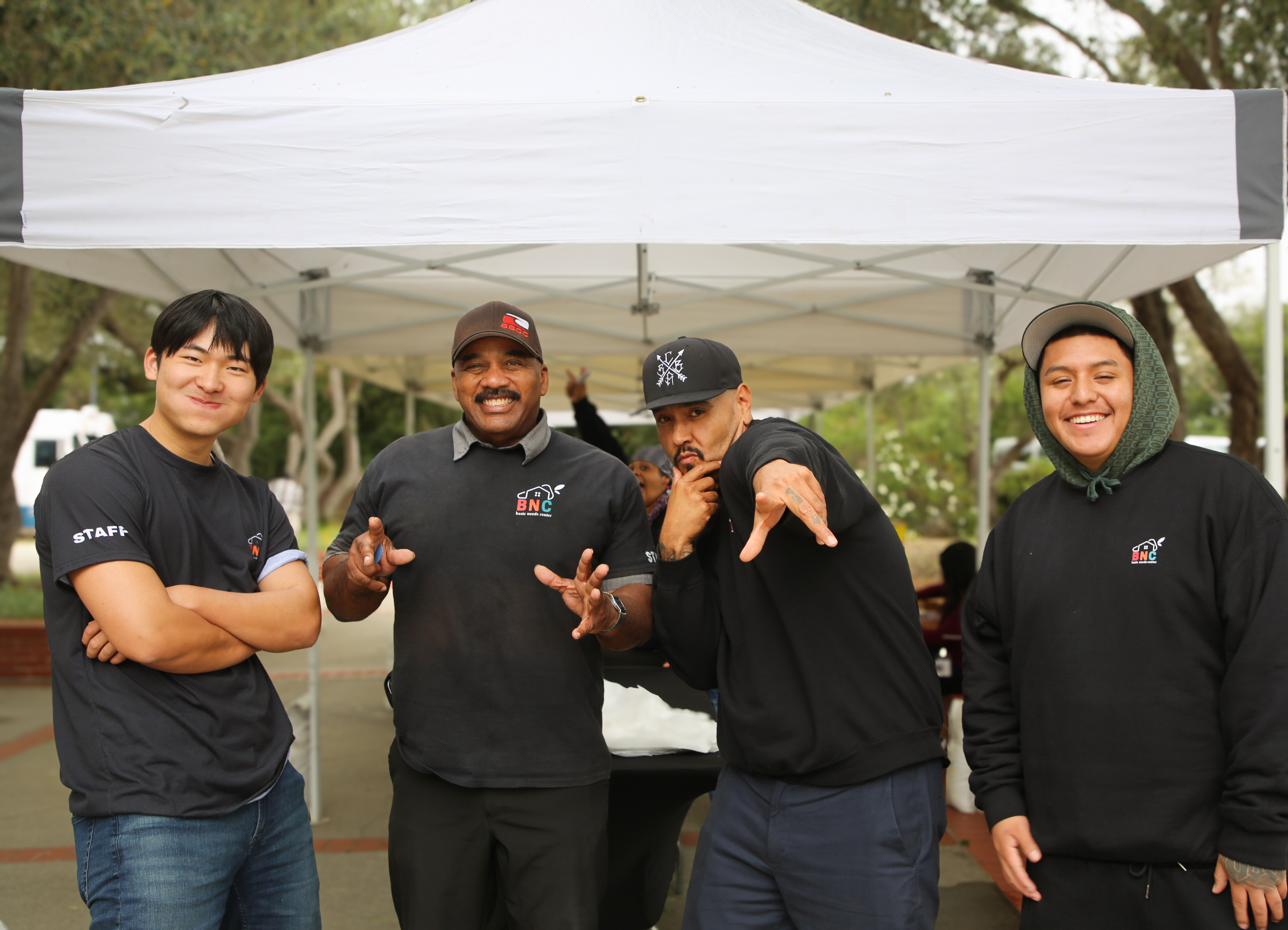 Basic Needs Center team wearing sweatshirts during food share event